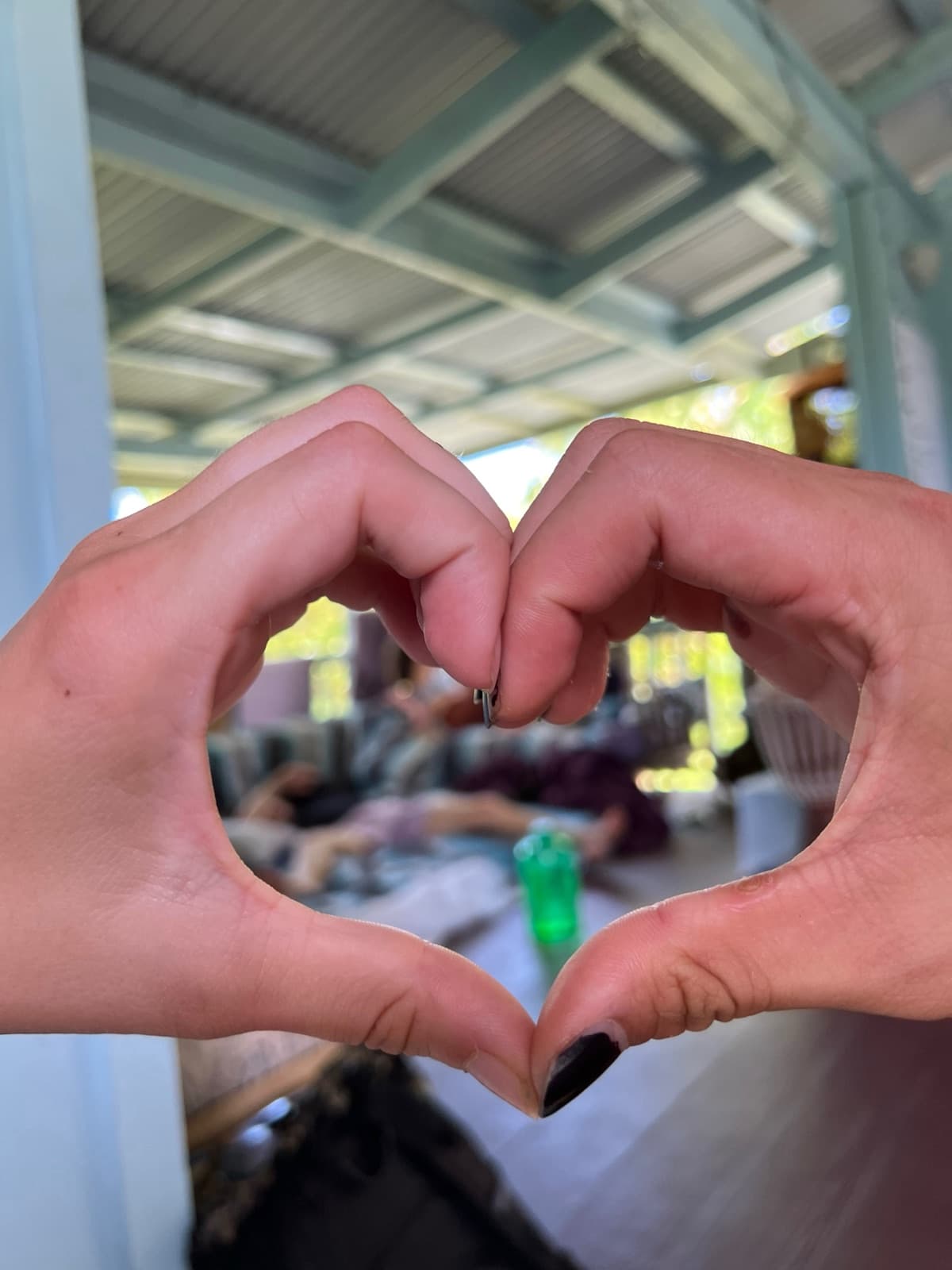 Two hands forming a heart shape