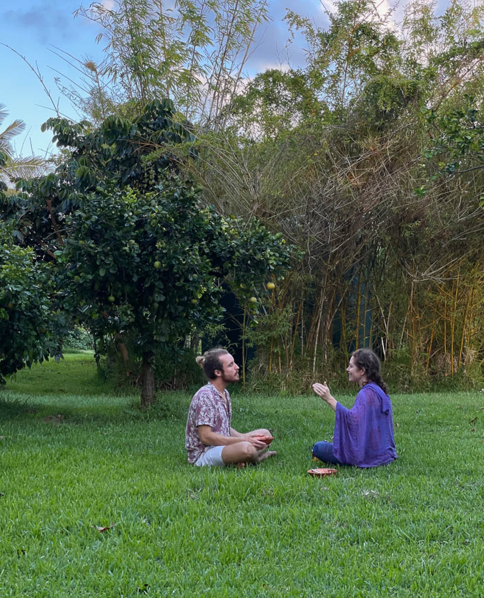 Two people practicing together outdoors